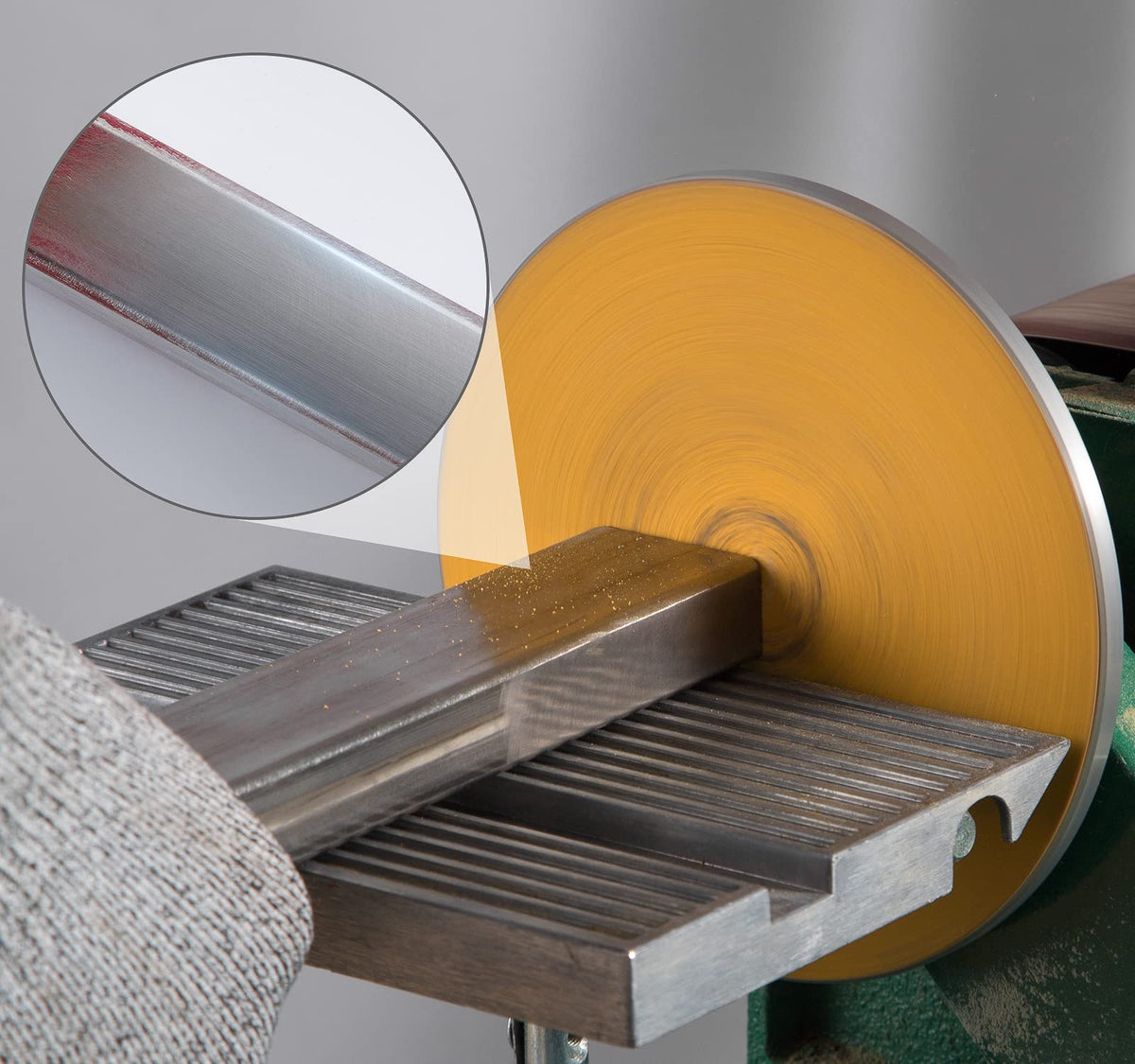 CowboyBOB disc used on metal surfaces for clean, consistent edge smoothing.