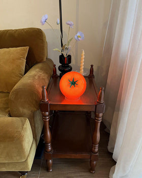Cozifycasa bedside tomato lamp elevates decor with warm orange-red hue