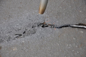 CRACK STIX applied on an asphalt crack demonstrates repair potential
