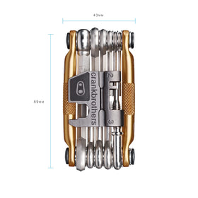 Crankbrothers M17 Gold side grip ergonomic design ensuring secure grip with gloves.