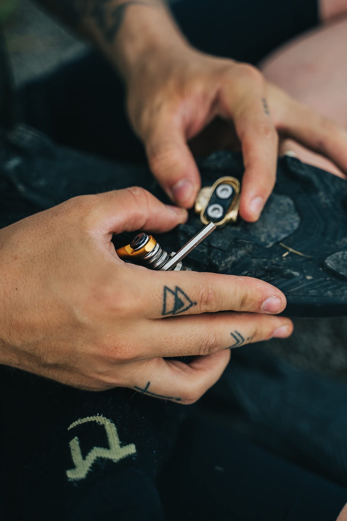 Crankbrothers M17 Nickel in-use on-trail image highlights gloves-friendly grip.
