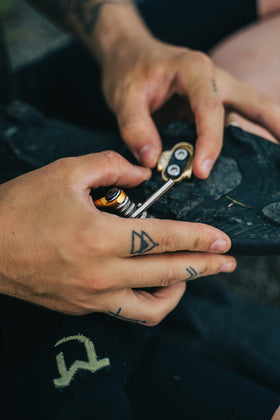 Crankbrothers M17 Nickel in-use on-trail image highlights gloves-friendly grip.