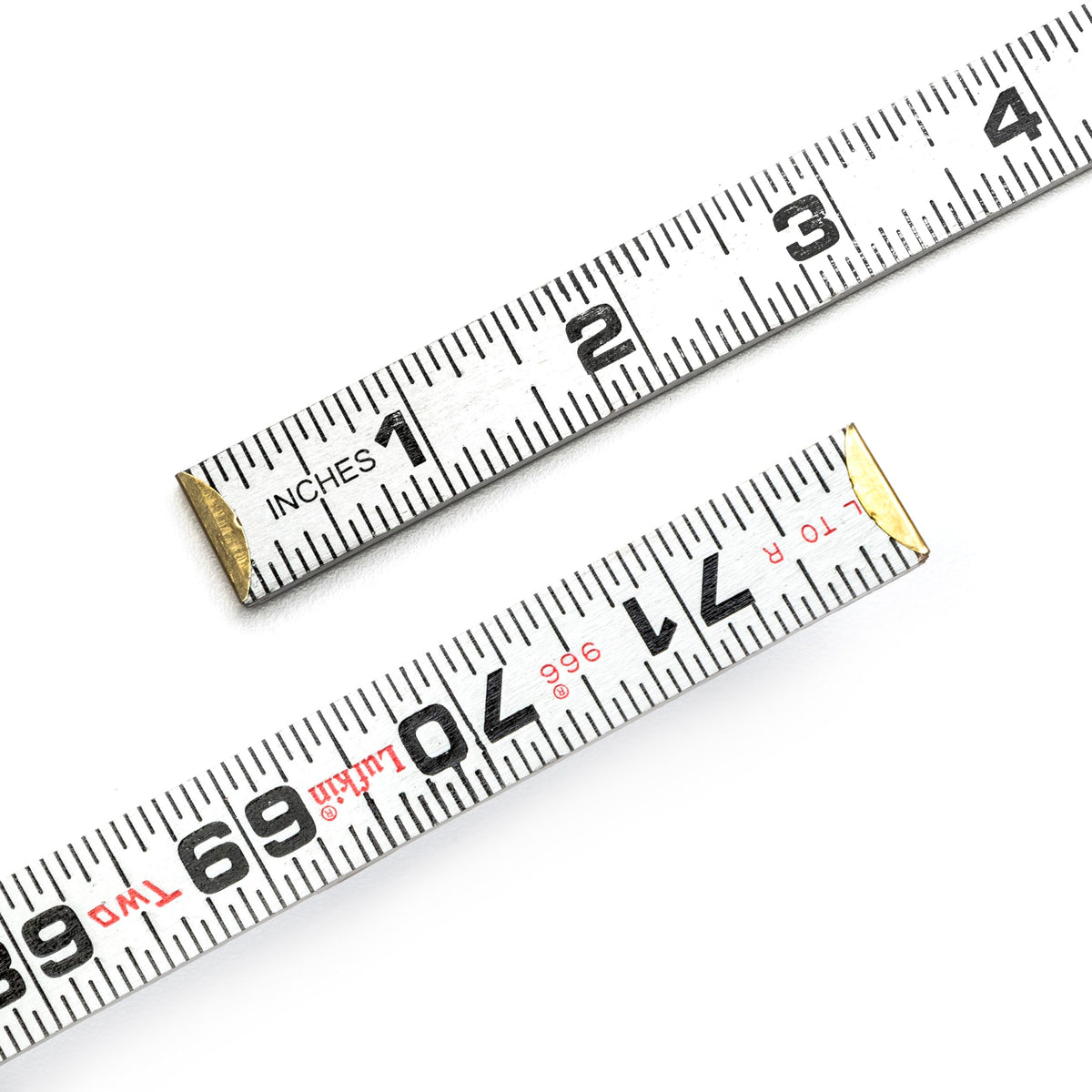 Crescent Lufkin rule features precise graduations across feet, inches, and 1/16s.