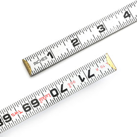 Crescent Lufkin rule features precise graduations across feet, inches, and 1/16s.