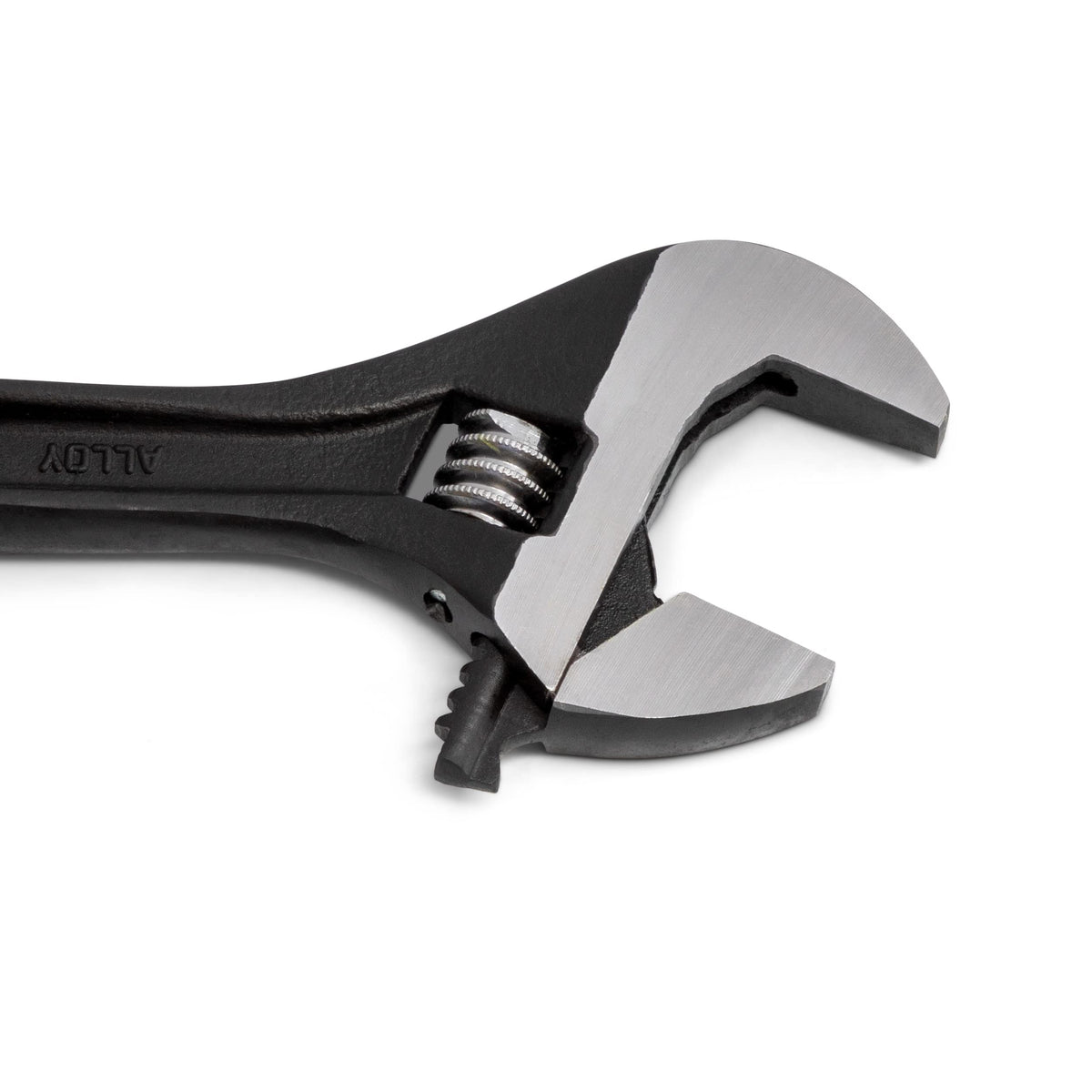 Crescent tension spring stabilizes jaw for consistent grip and smooth adjustment