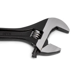 Crescent tension spring stabilizes jaw for consistent grip and smooth adjustment