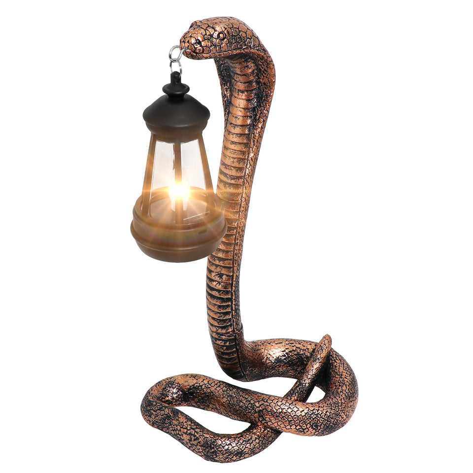 CSZLSMH solar snake lantern in brass tones lighting a garden path