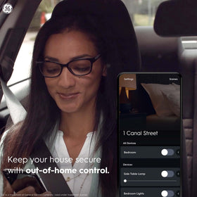 Cync smart paddle switch in use with a lamp demonstrates app and scene control.