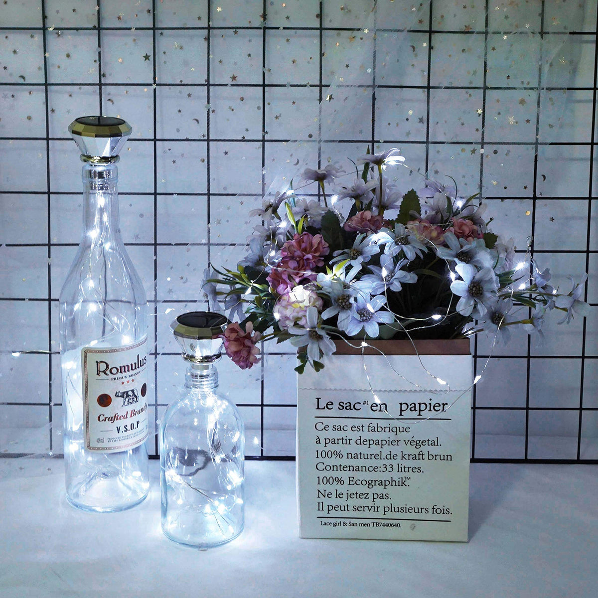 Cynzia solar wine bottle lights wedding table creates romantic centerpiece lighting.