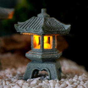 Daisylily Japanese Pagoda LED Lamp, close view of the pagoda lantern glow for warm ambiance.