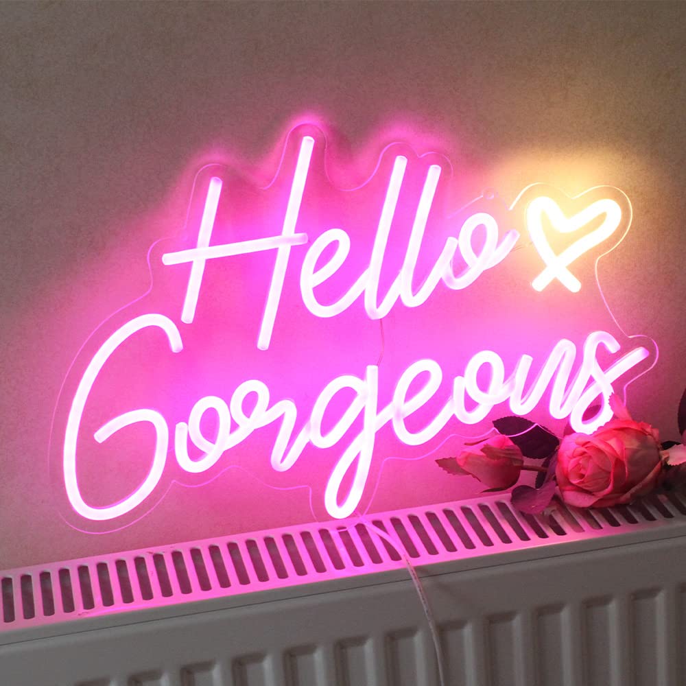 DAKABUKA Hello Gorgeous pink neon sign used as wedding backdrop setup.