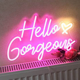 DAKABUKA Hello Gorgeous pink neon sign used as wedding backdrop setup.