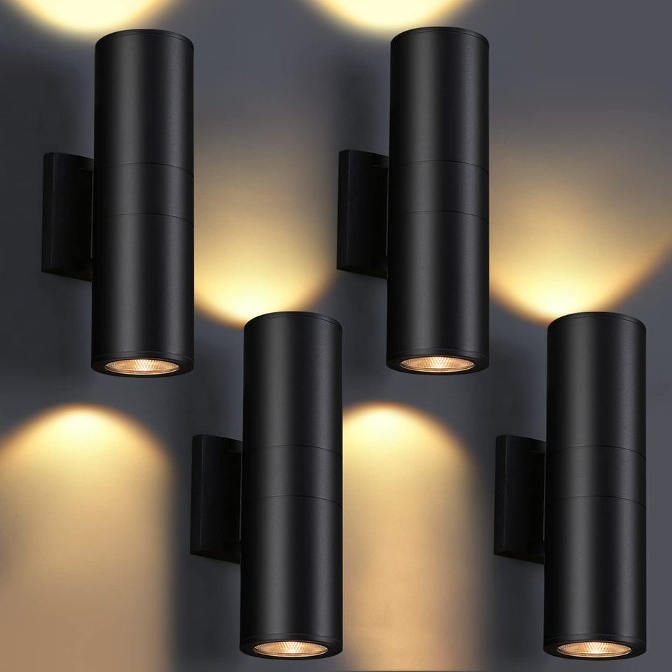 Dakaful outdoor wall lights 4-pack with integrated LED cylinder for ambient exterior illumination.