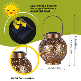 Damayca bronze lantern glowing at dusk on an outdoor table