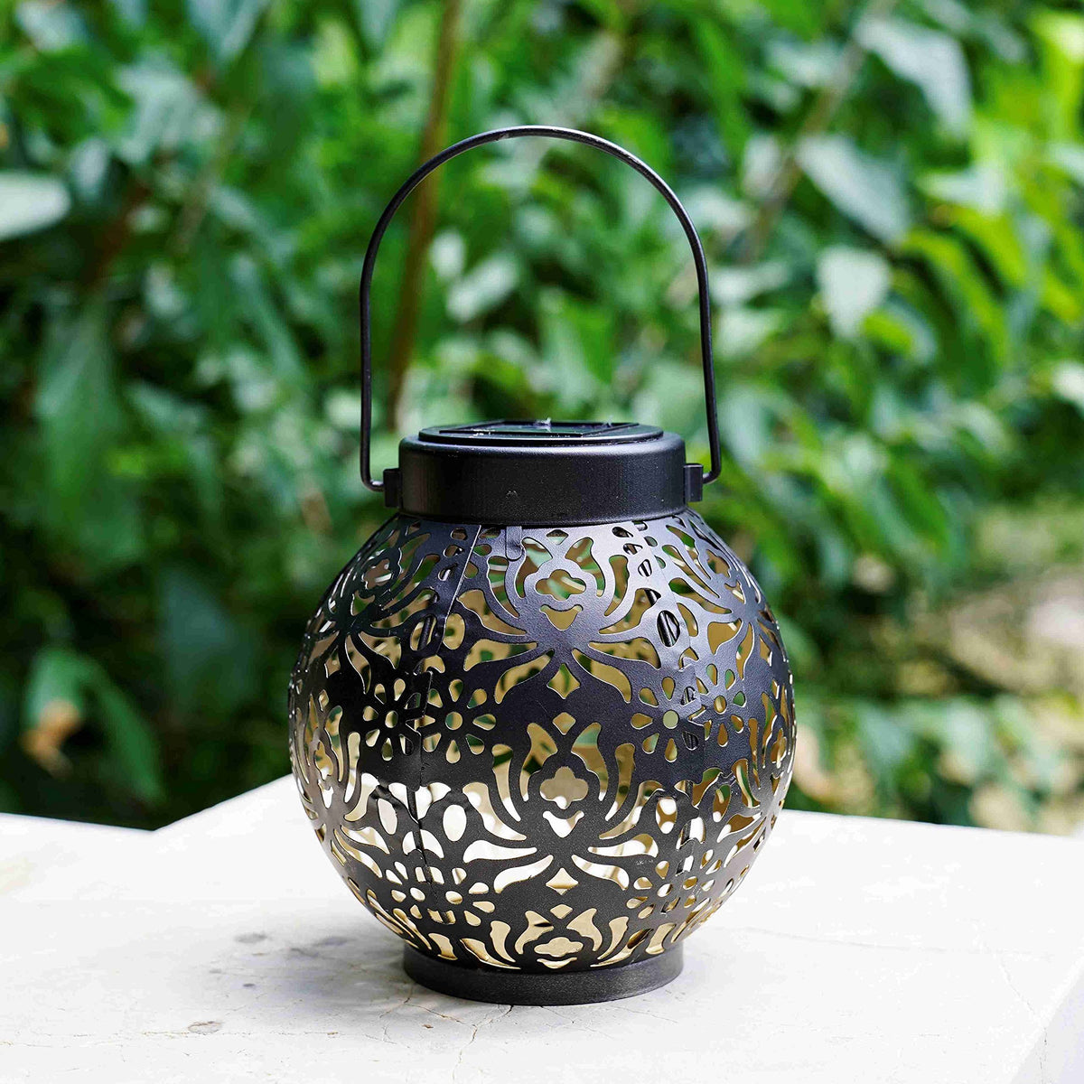 DAMAYCA lantern hangs outdoors for charming patio lighting
