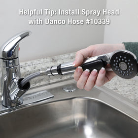 Danco 10408 universal-fit spray head shown on faucet connection for easy replacement.