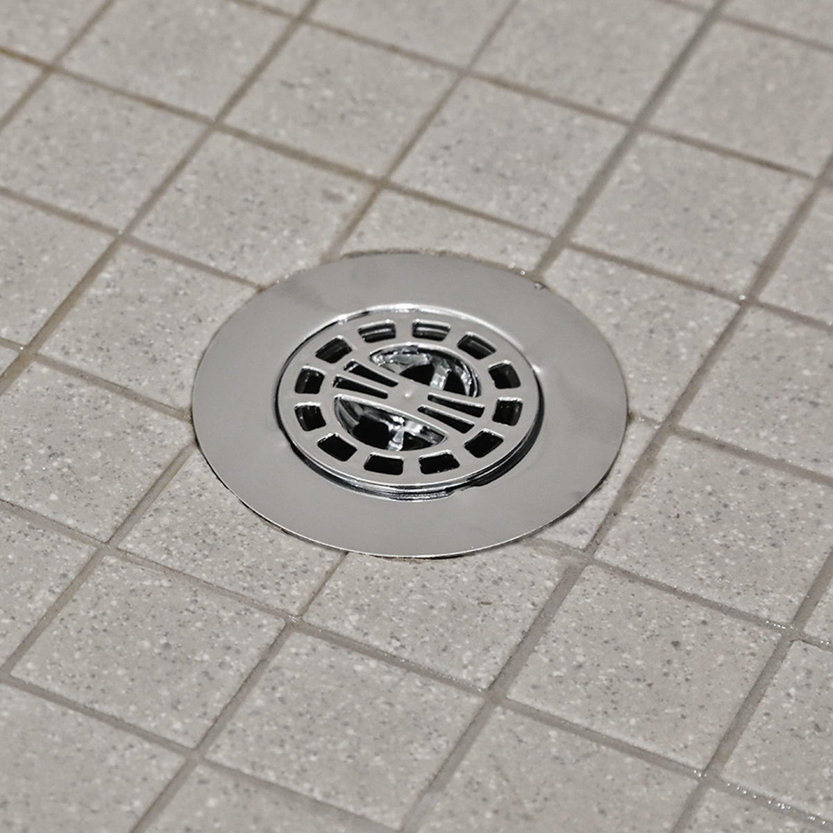 Danco 10529P chrome drain cover clearly fits standard 3-inch shower drains.