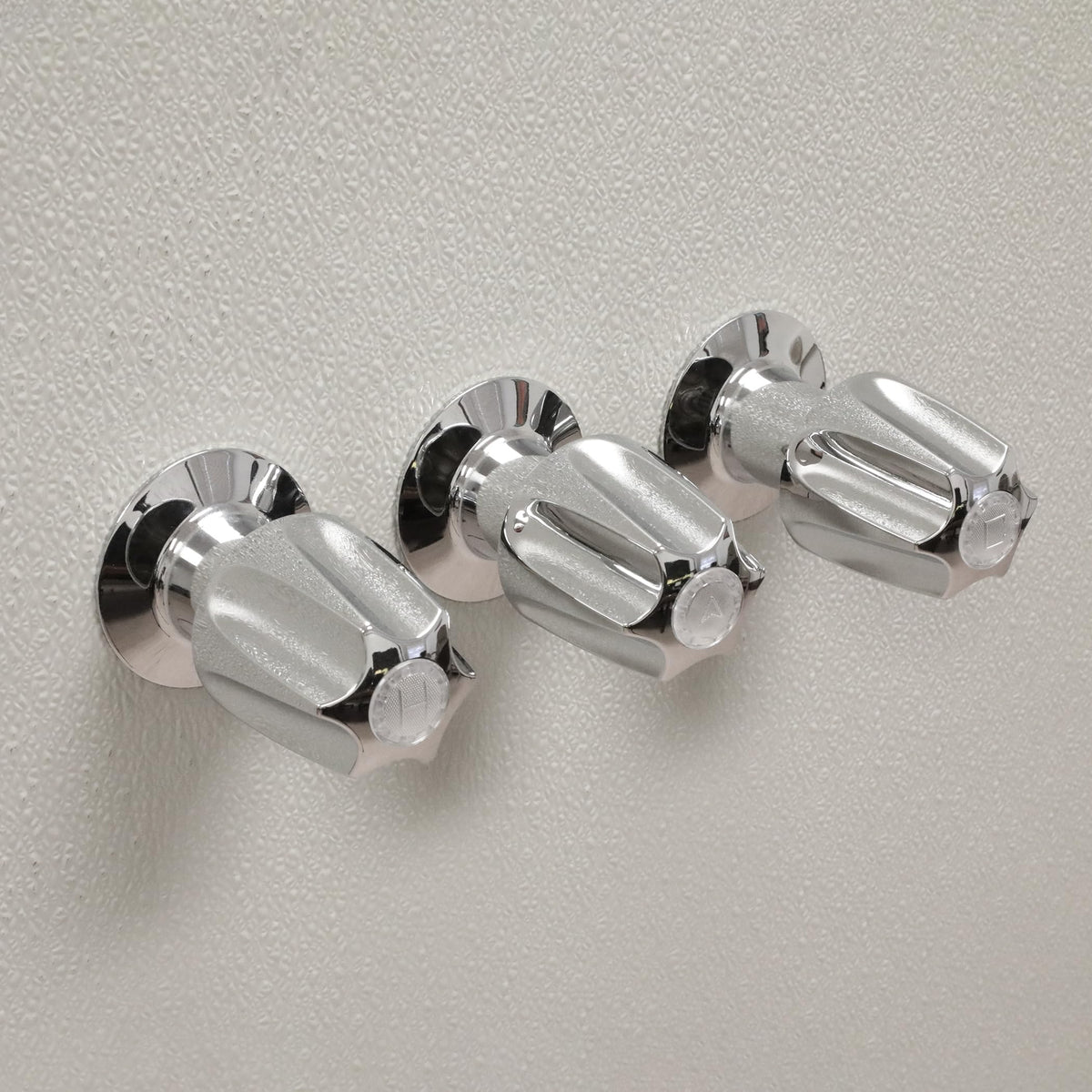 Danco brass stems close-up showing durable construction.