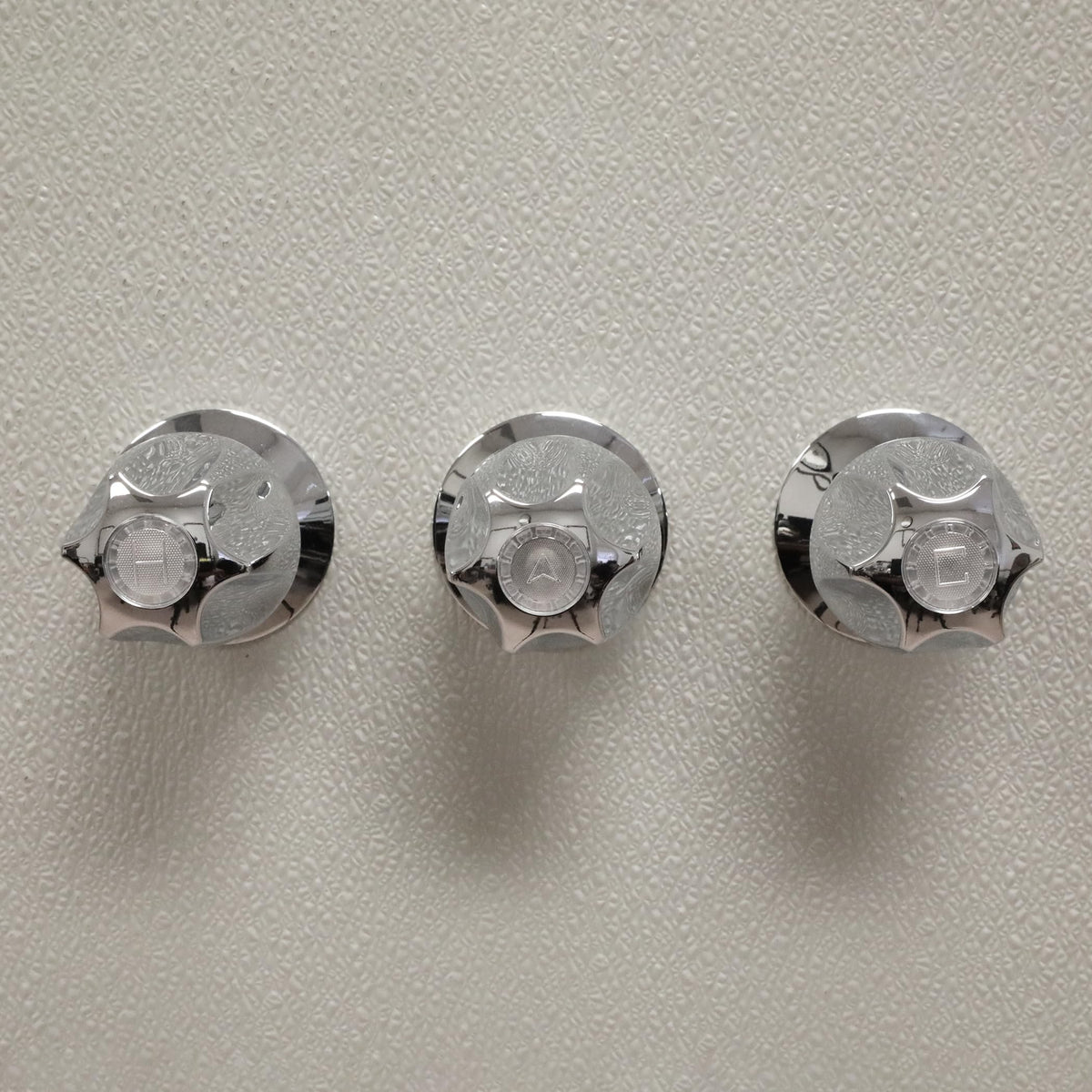 Danco chrome finish handles detailed for smooth operation.