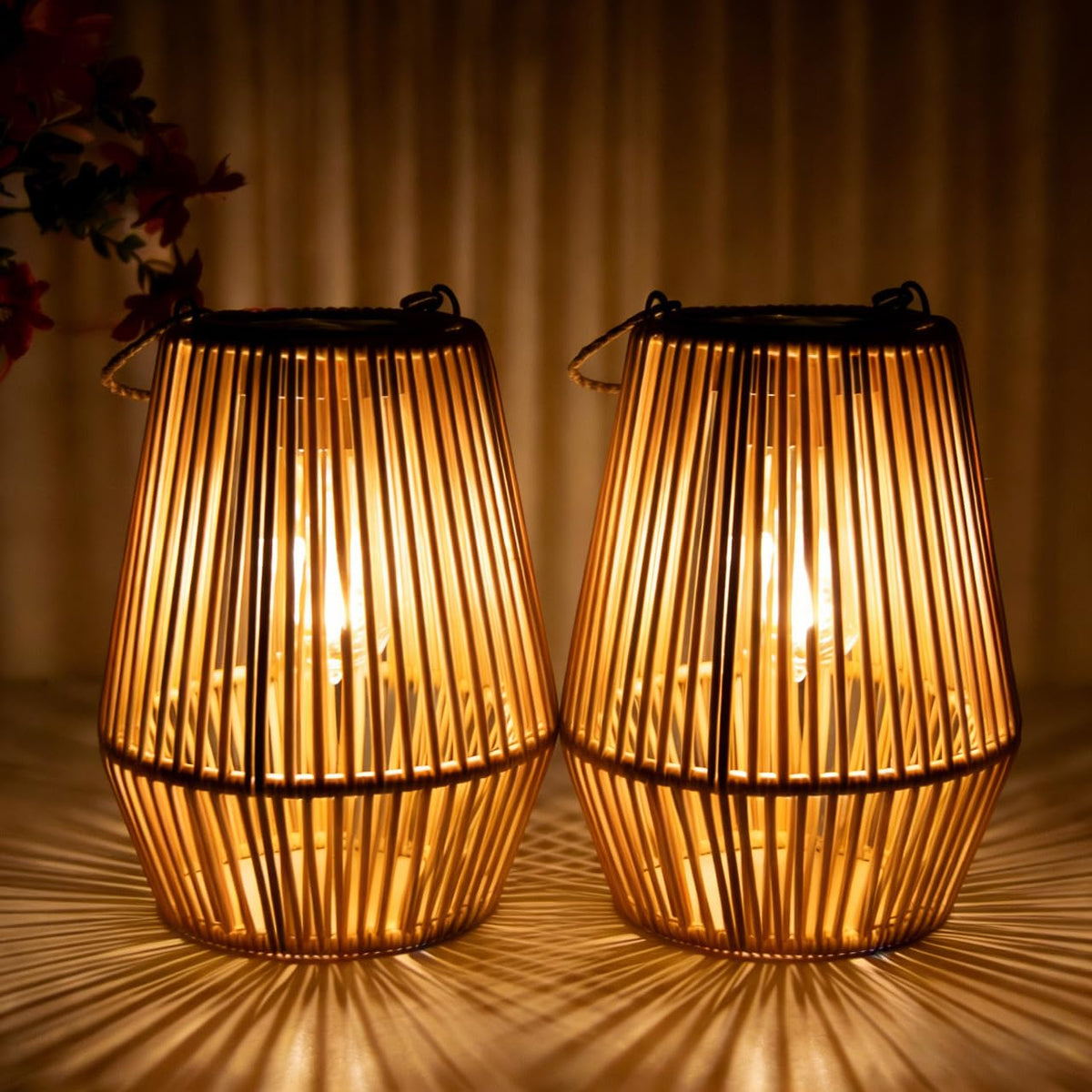 Danhh solar lantern with openwork-rattan design provides ambient outdoor lighting.