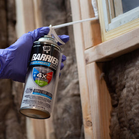 DAP Barrier Foam extension straw shown for precise application in tight gaps.