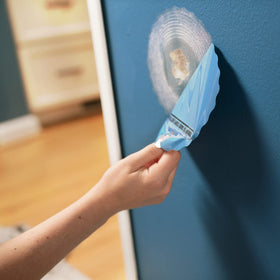 Patch applied to interior wall ready for painting, ideal for high-traffic areas.