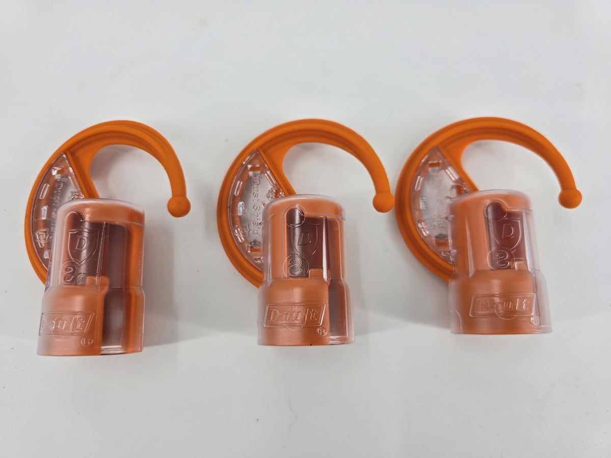 DAULT heavy-duty wall hooks securely hold Stihl Kombi attachments in a busy workspace