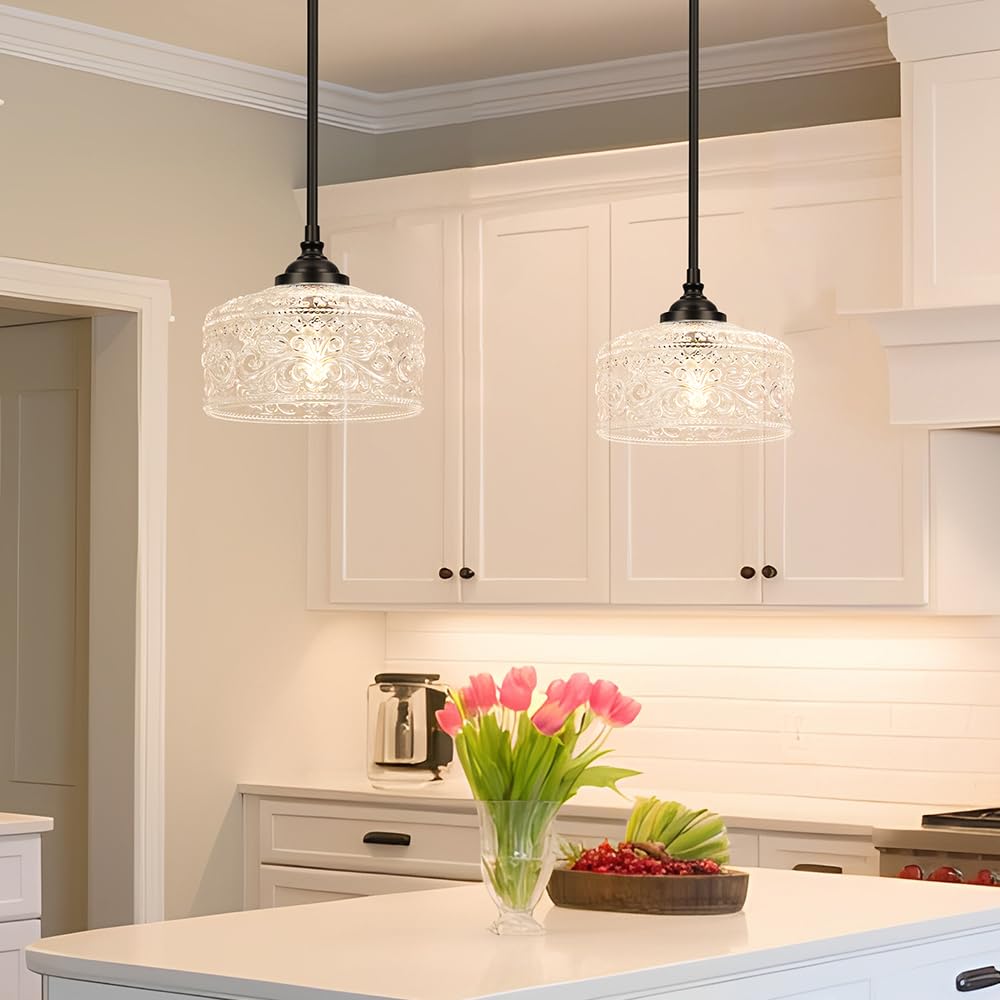 Daunton adjustable-height pendant showcases versatile elevation for tables or countertops.