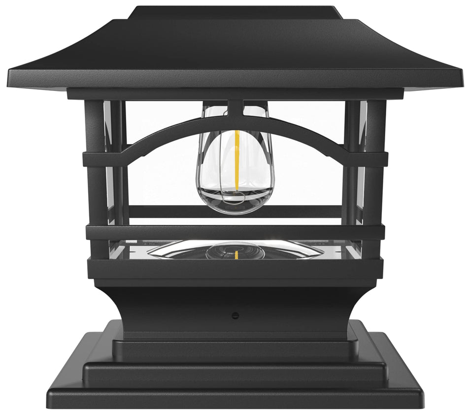 Davinci Lighting Edison solar post cap on a wooden 4x4 post casts warm light along a fence