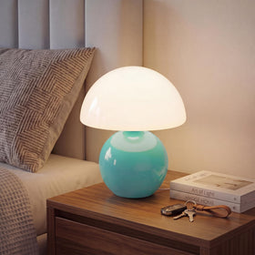 Dawnwake blue mushroom lamp with glass base provides ambient bedside glow