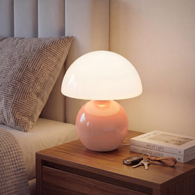 Dawnwake mushroom lamp shade glows with soft ambient lighting for a cozy bedroom.