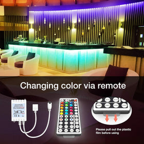 DAYBETTER color-changing LED strip mounted on wall for ambient bedroom lighting