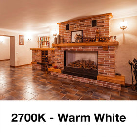 DAYBETTER warm white 2700K filament candle bulb closeup enhances cozy dining ambiance