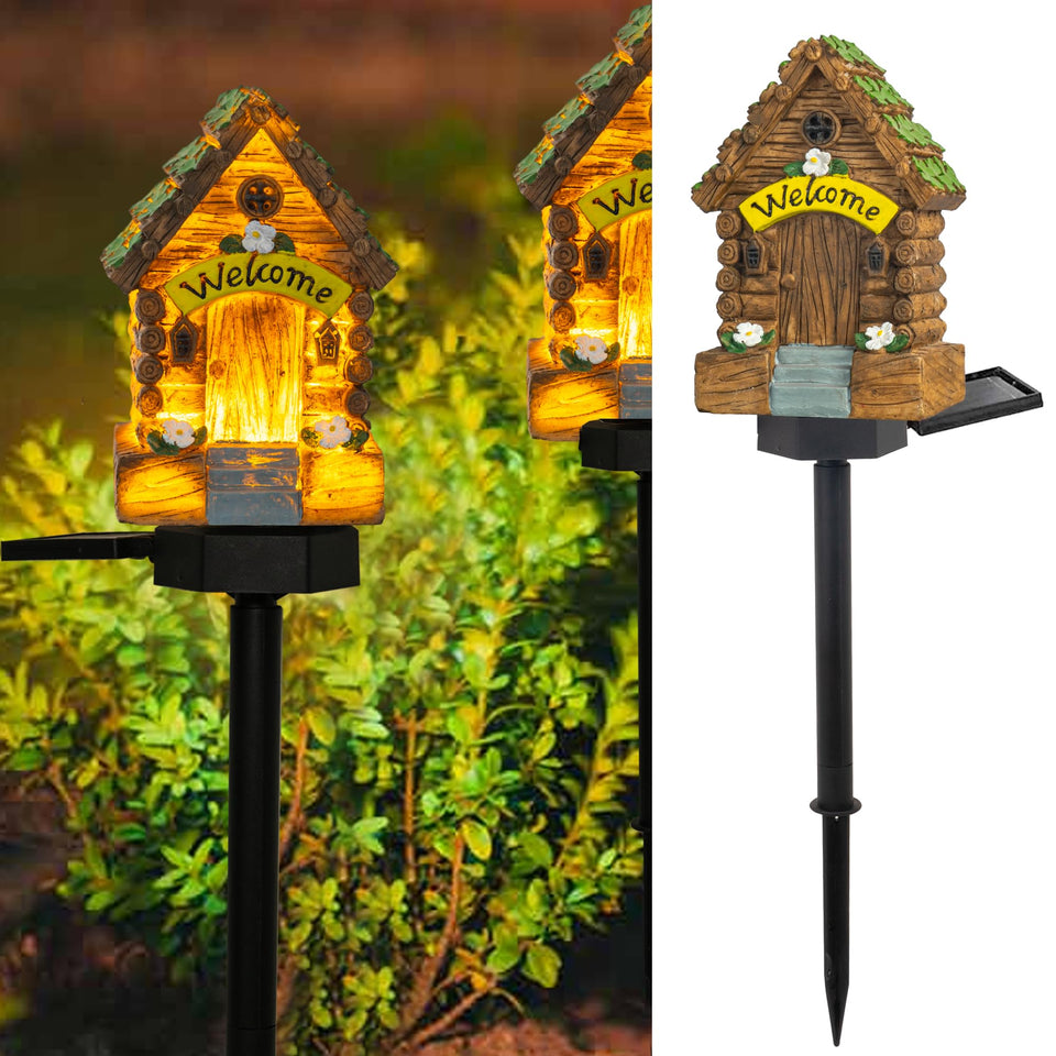 Dazzle Bright Fairy Garden House 16-inch glowing in outdoor garden at night