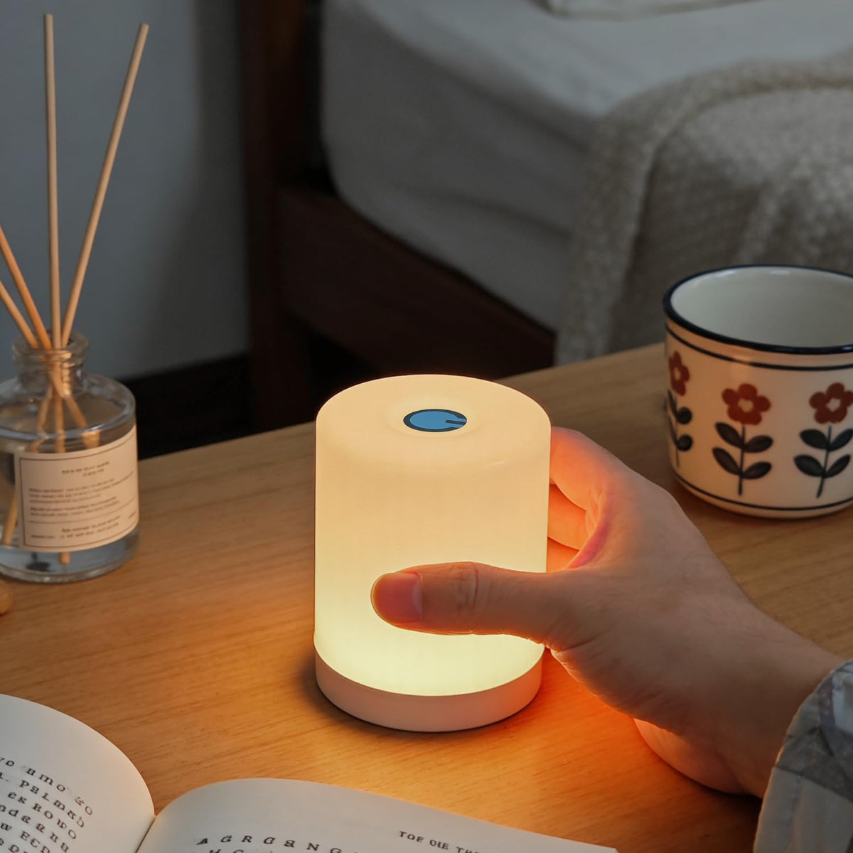 DAZZY DOT portable night light in nursery provides a gentle glow for nighttime feeds.