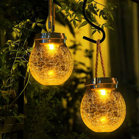 DBF solar lantern with crackle glass globe for outdoor ambiance.