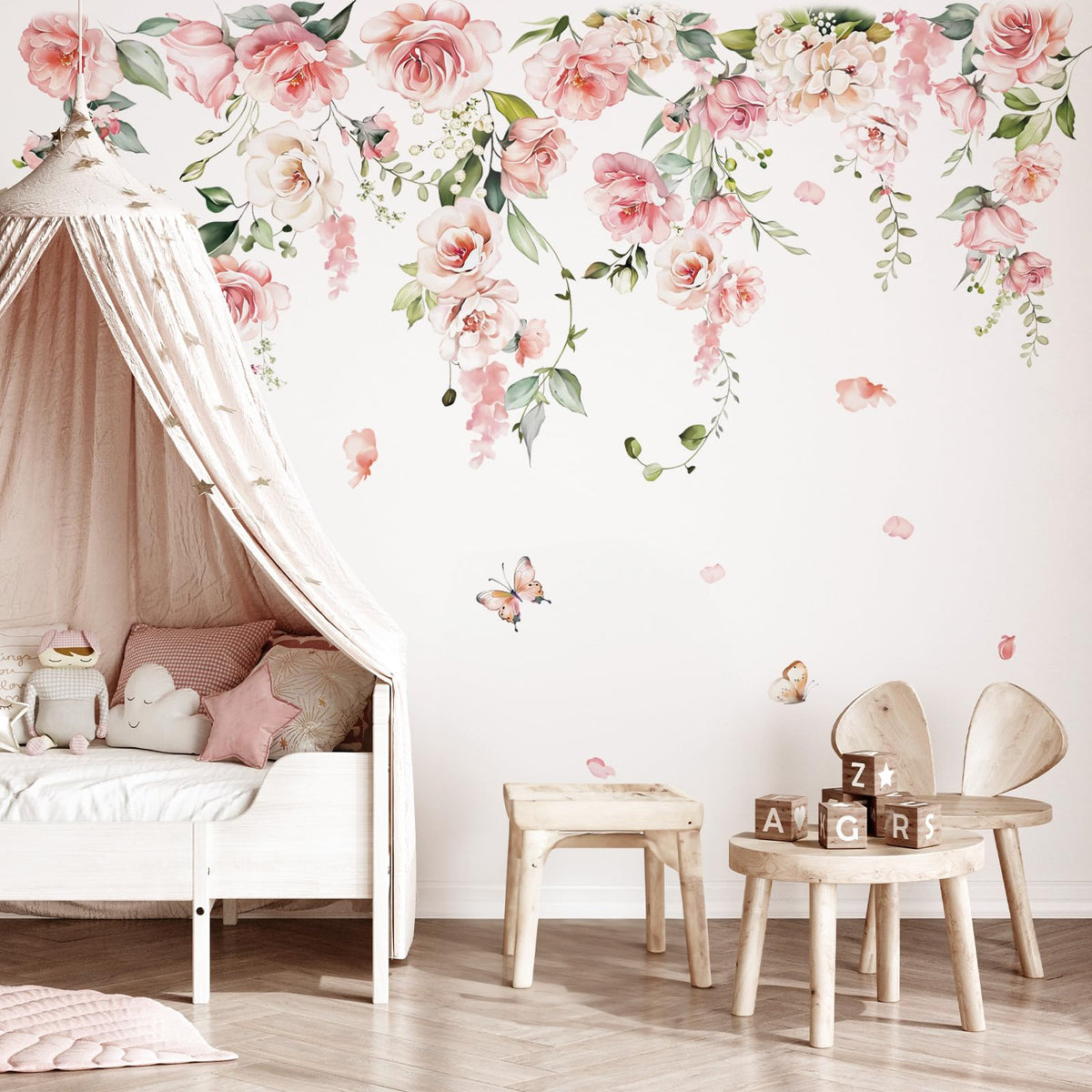 DecalMile large pink flower wall decal adds a soft focal point to living rooms.