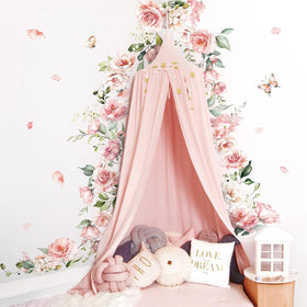 DecalMile pink rose vine decor brightens a girl’s room with colorful charm.