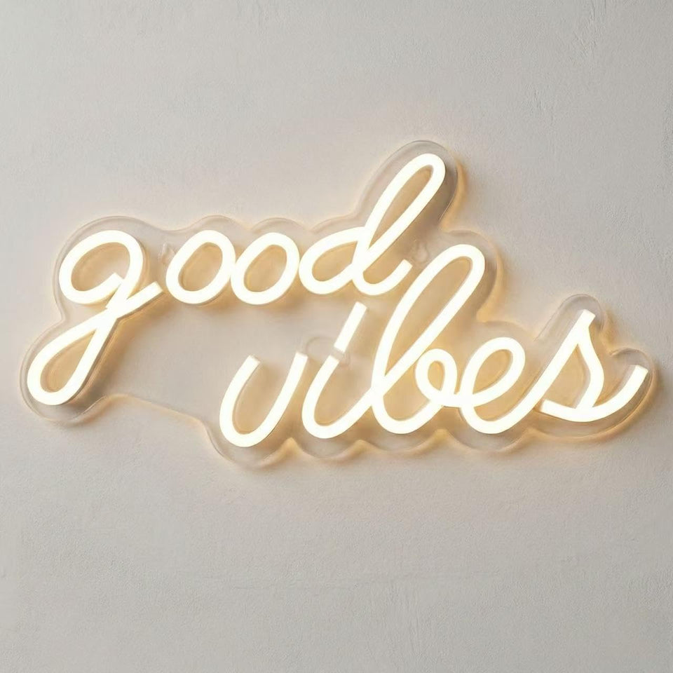 DECANIT Good Vibes neon sign glowing warm white for cozy living spaces