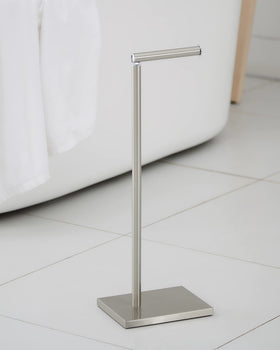 DECLUTTR toilet paper holder stand fits most rolls including jumbo sizes.