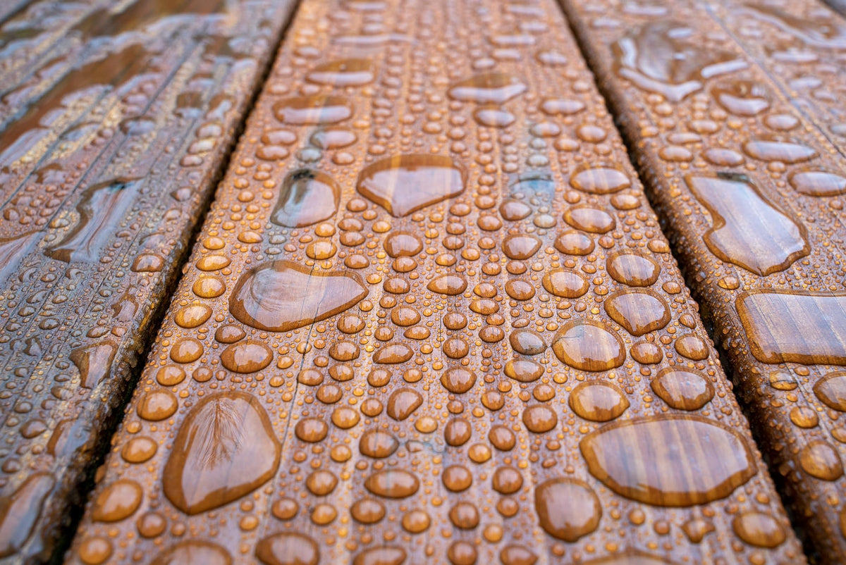 DEFY Extreme cedar-tone stain on railings offers UV resistance and color retention.