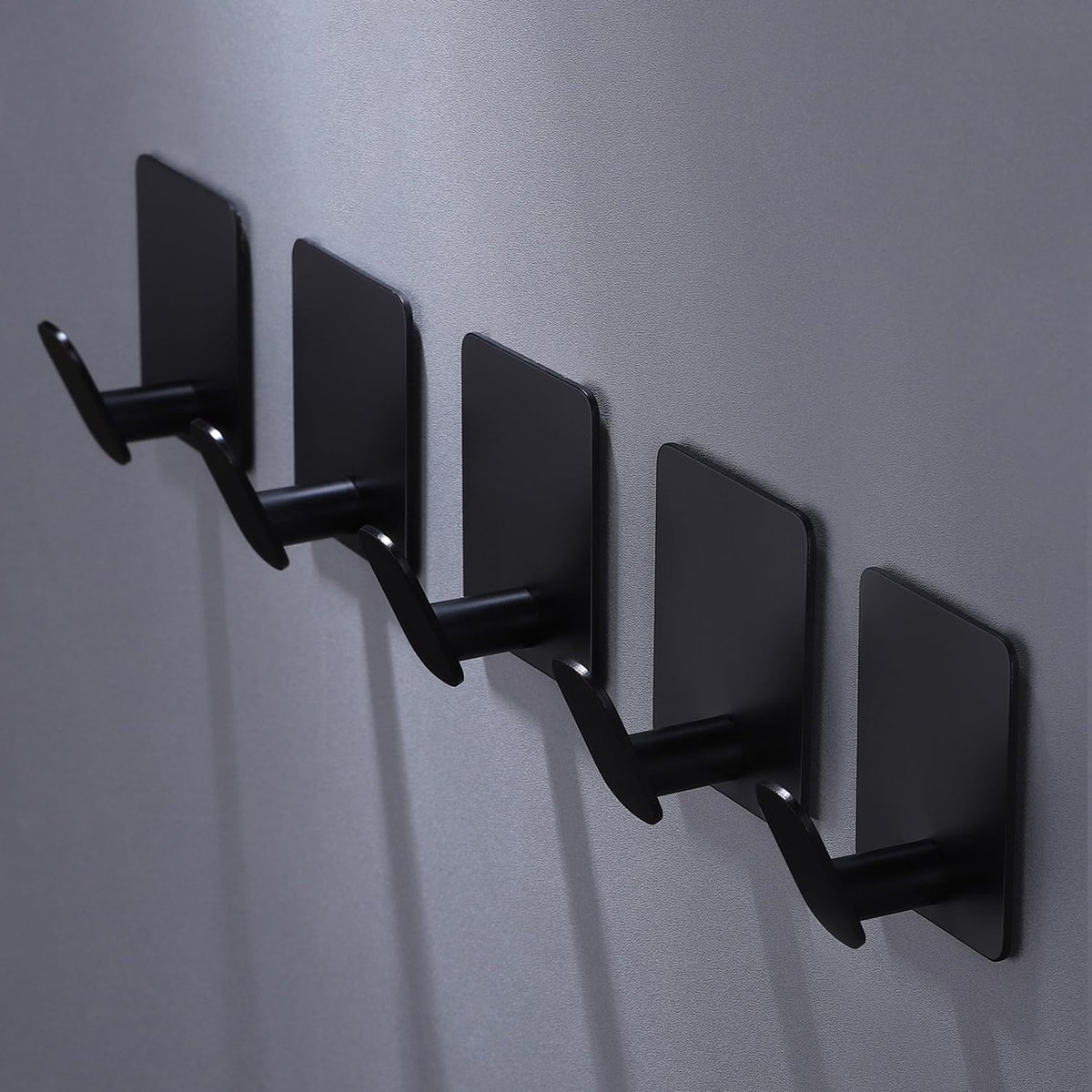 DELITON adhesive towel hooks shown on wall for easy installation and space saving.