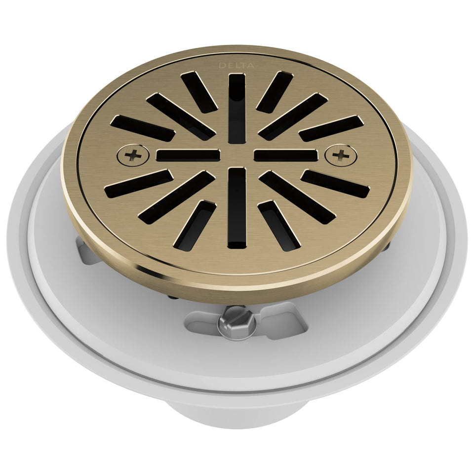 Delta tile-in round shower drain in champagne bronze for a seamless bathroom floor