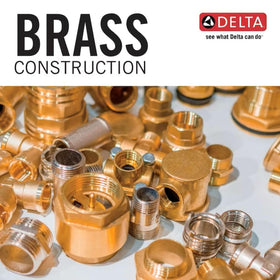 Close-up of champagne bronze finish on Delta flange and strainer.