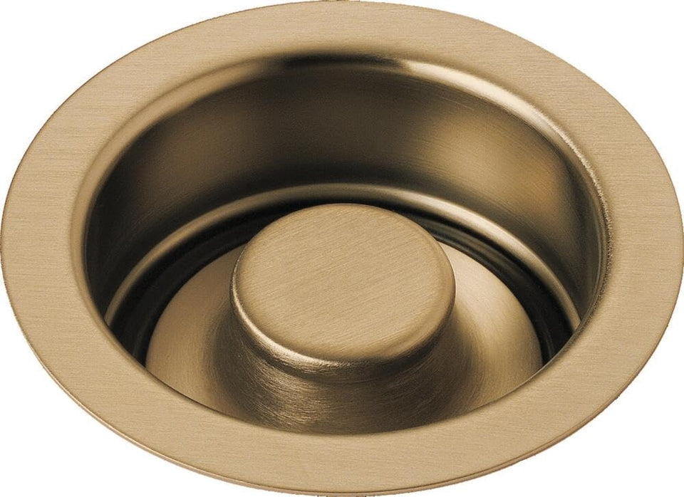 Delta 72030-CZ disposal stopper in champagne bronze for a secure kitchen seal.