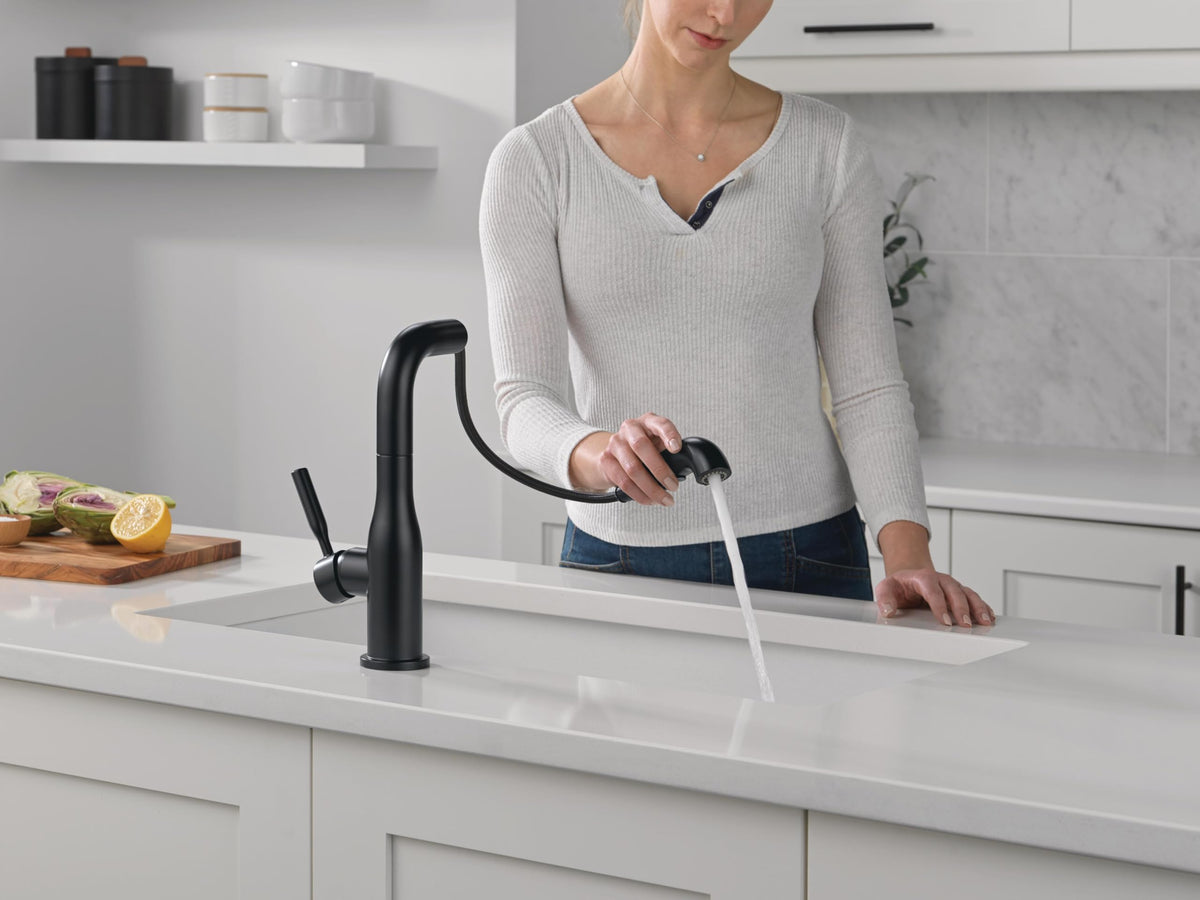 Delta Almari matte black faucet shown with single-hole installation and deck plate