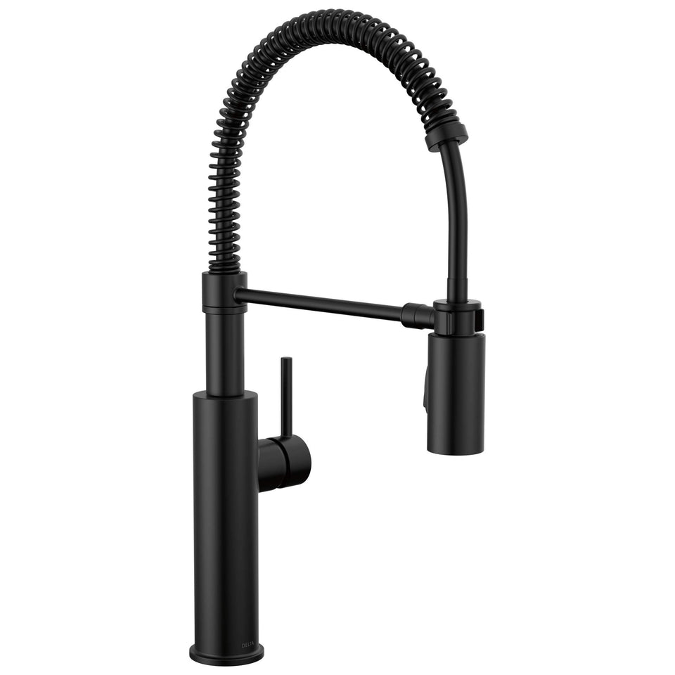 Delta Antoni Pro Style faucet with pull-down spray in action for efficient kitchen tasks