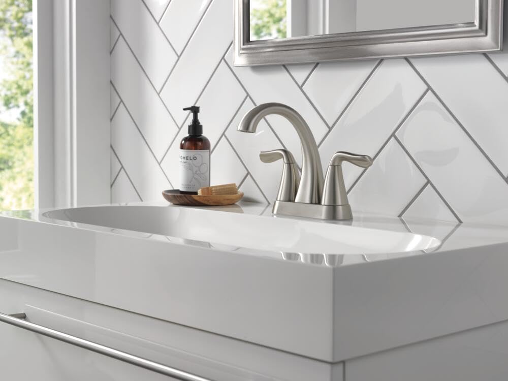 Delta Arvo Brushed Nickel faucet in a modern bathroom scene