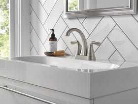 Delta Arvo Brushed Nickel faucet in a modern bathroom scene