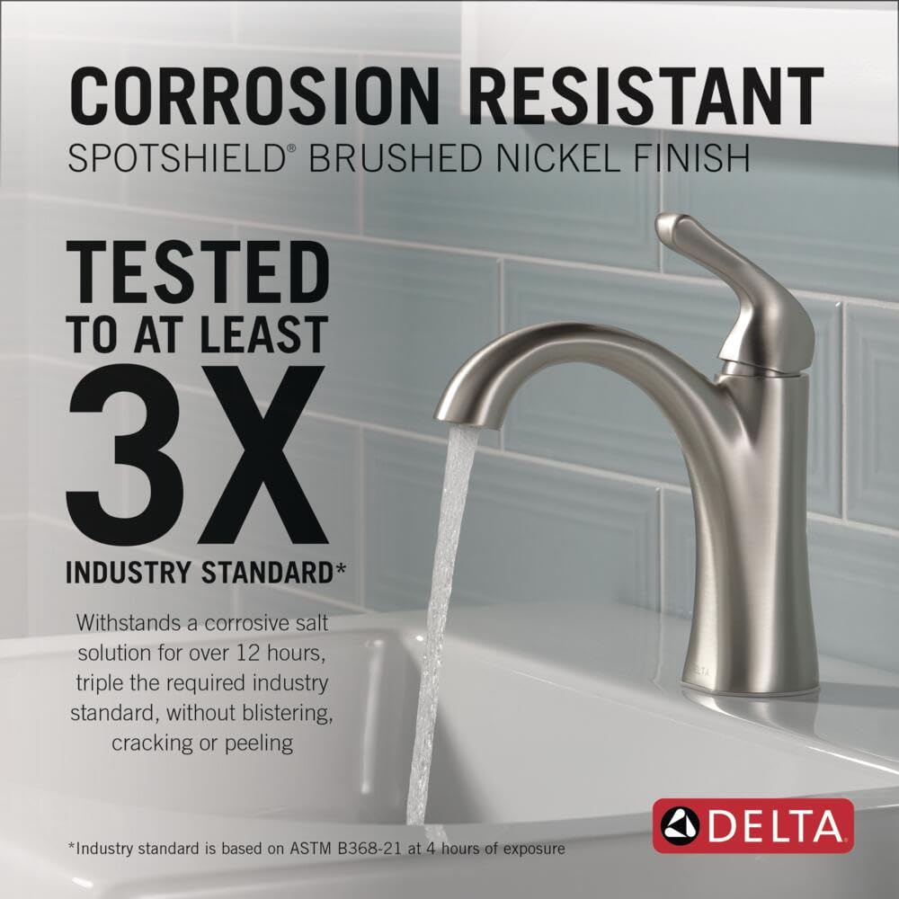 Delta Arvo handle closeup showing smooth operation and SpotShield resistance.